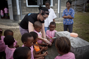 Katy on April 5 showing pre-school children how to wash their hands ~ photo courtesy
