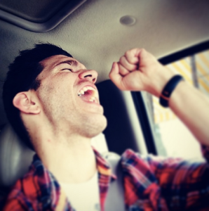 Andy goofing off and singing,"THE!SINGLE!IS!FINISHED!"