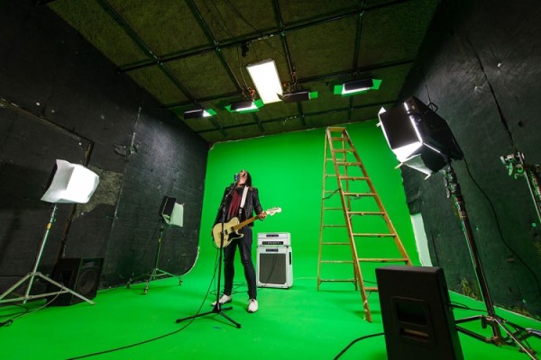Jeff in front of the green screen during the video shoot for "Someday, So Clear"