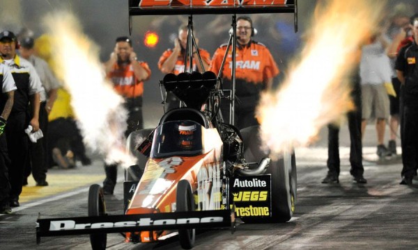 In their first finals head-to-head matchup, Courtney Force snatched the Funny Car victory from her legendary father John Force at the Inaugural Auto-Plus NHRA New England Nationals at New England Dragway in June '13 ~ Photo courtesy of motorntv.com
