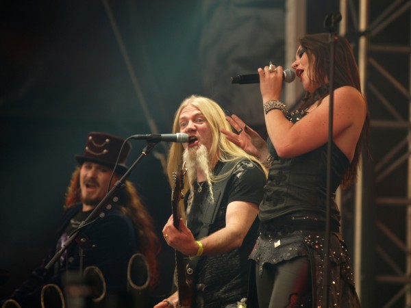 Nightwish in 2013 at the Tuska Open Air Metal Festival ~ L -R: Holopainen, Hietala, and Jansen