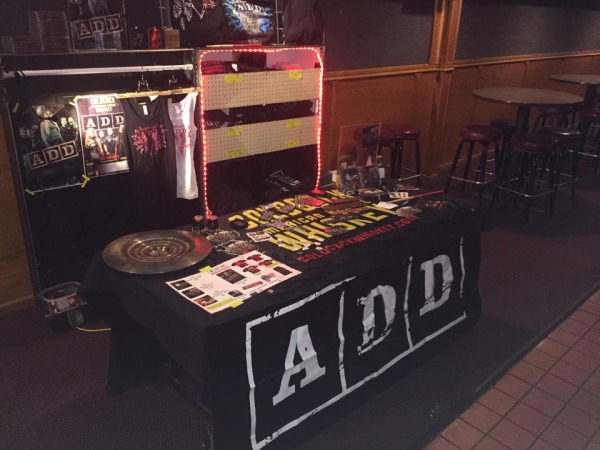 The band's merch table at Pov's 65 before it was picked clean by fans!