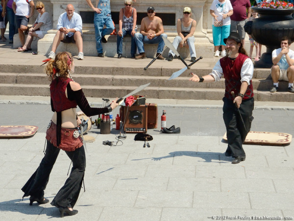 Brave street performers entertain an all-ages audience